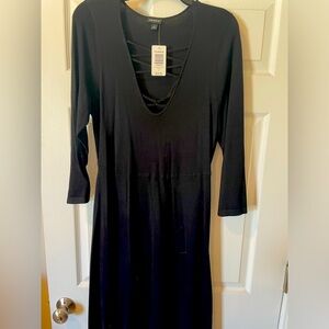Black sweater dress with plunging neckline